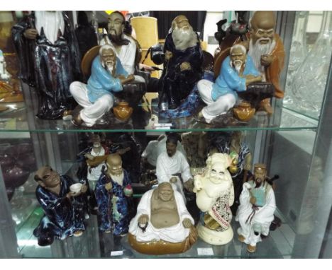 A quantity of Japanese ceramic figurines (14) - This lot MUST be paid for and collected, or delivery arranged, no later than 