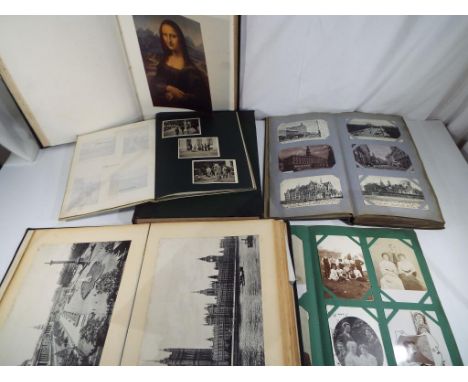 A good lot to include two volumes of 100 Famous Paintings published by Cassell Company , an album featuring black and white p