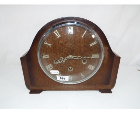 An oak cased Smiths mantel clock with pendulum and key  - This lot MUST be paid for and collected, or delivery arranged, no l