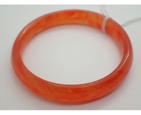 Orange jade wrist bangle D: 7 cm