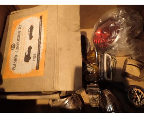 Box of vintage car indicators lenses and bicycle dynamo etc