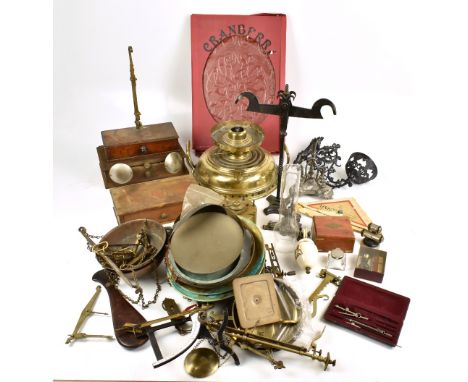 A collection of assorted scale parts, together with assorted metalware including a brass oil lamp base, iron oil lamp bracket