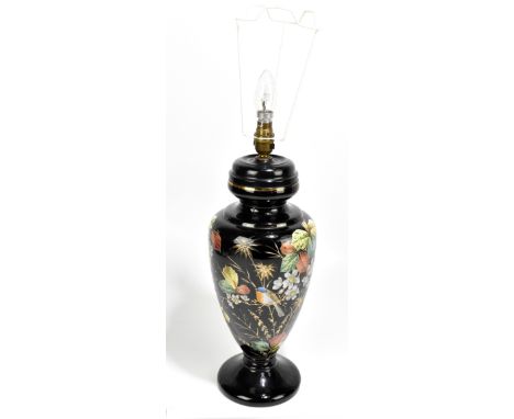 A Victorian hand painted glass table lamp painted with stylised birds and floral sprays in the Jackfield style, with applied 