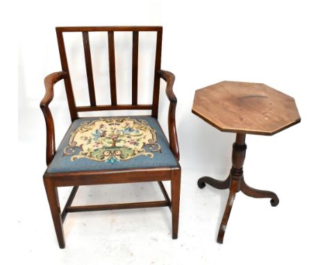 A Georgian mahogany open arm elbow chair with splat back and tapestry drop in seat, together with a 19th century octagonal to