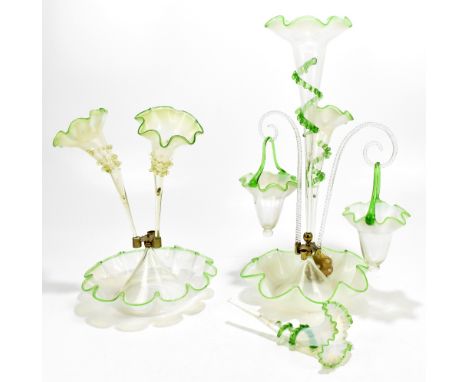 A Victorian vaseline glass three branch epergne, with green glass rims and trailed decoration, with two glass arms supporting