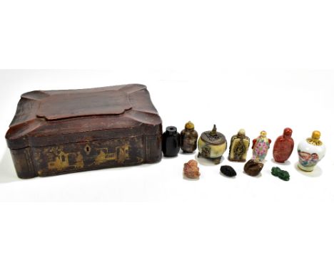 A Chinese&nbsp;papier-mâché lidded work box with gilt highlights (rubbed),&nbsp;length 28cm, also assorted Oriental snuff bot