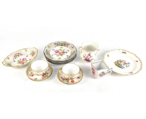 DRESDEN; a group of floral decorated wares including four saucers, two cups, pierced oval dish, four side plates with pierced