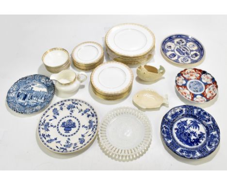 ROYAL DOULTON, an H4989 'Gold Lace' pattern part dinner service comprising dinner plates, side plates, saucers, bowls and cre