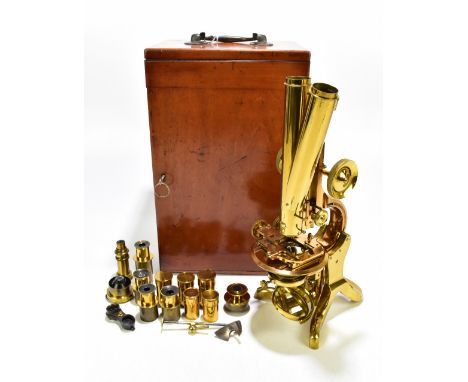 J SWIFT & SONS OF 81 TOTTENHAM COURT ROAD LONDON; a good 19th century brass binocular microscope with lacquered body and Wenh
