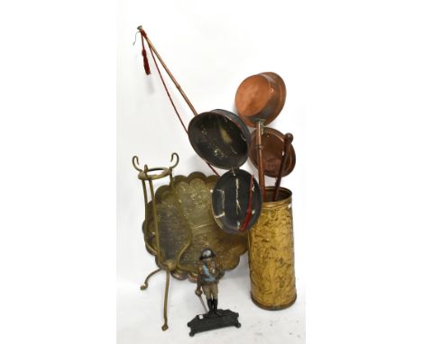 A small collection of assorted metalware, including cast iron door stop in the form of Napoleon, brass stick stand, copper wa