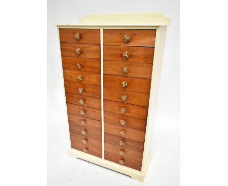 A white painted chest of twenty-two drawers, raised on bracket feet, width 72cm, height 122cm, depth 33cm.Additional Informat