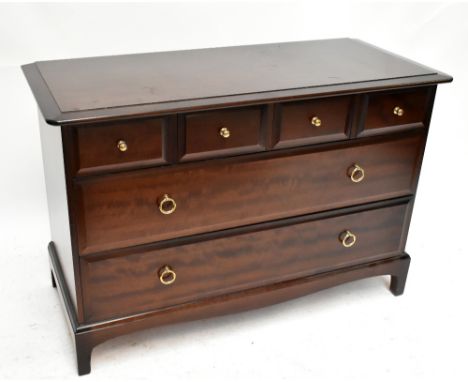 STAG MINSTREL; a chest of four short over two long drawers, raised on bracket feet, length 107cm, depth 47cm, height 72cm.Add