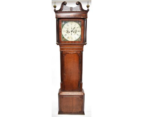 An early 19th&nbsp;century oak, mahogany and inlaid eight day longcase clock with broken swan neck fret-cut pediment and twin