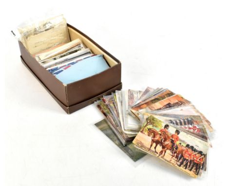 A group of postcards including a military sweetheart example, Louis Wain, topographical, humorous, portrait, etc.
