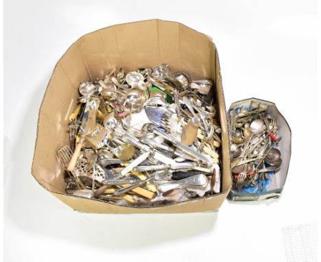 A large quantity of silver plated flatware including crumb scoops, knives and forks, asparagus tongs, fish tools, etc.