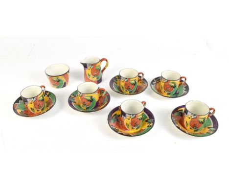 GRIMWADES; a fourteen piece part coffee service with geometric decoration.Additional InformationOne cup has had the handle br