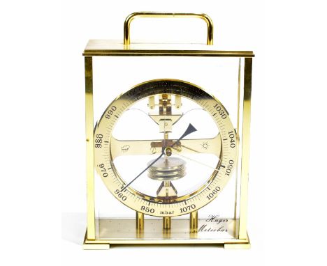 HUGER METEOBAR; a contemporary brass cased barometer, height including handle 21cm, width 15cm.
