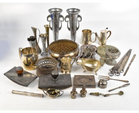 A small collection of assorted silver plate to include a Hukin &amp; Heath water pot with wicker handle, mugs, etc.Additional