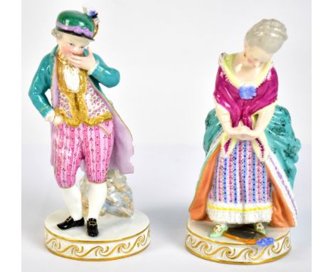 MEISSEN; a pair of 19th century figures, the first depicting a boy standing beside a column, the second a girl wearing a crin