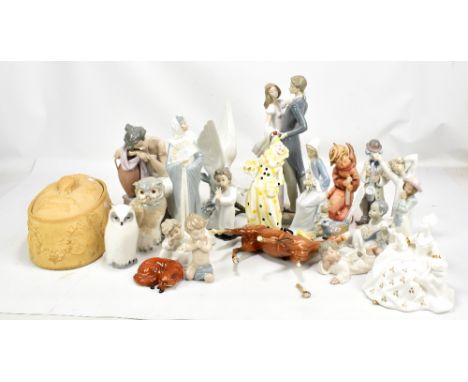 A group of ceramic figures to include Lladro, Nao, Coalport and an unglazed lidded pie dish.