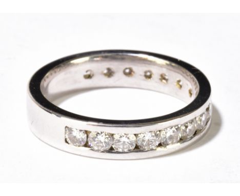 A platinum and diamond three quarter eternity ring set with sixteen round brilliant cut stones totalling approx 1ct, ring siz