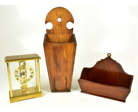 A reproduction stained oak candle box, height 46cm, together with a similar mahogany example, also an Acctim mantel clock (3)