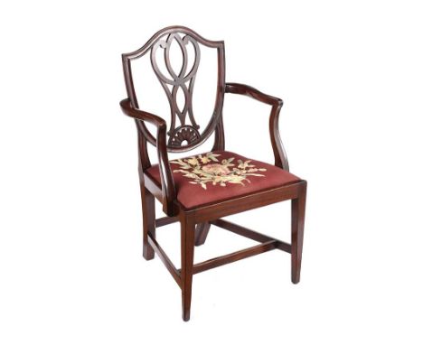 GEORGIAN MAHOGANY PIERCED BACK ARMCHAIR WITH UPHOLSTERED TAPESTRY SEAT.RAISED ON TAPERED LEGS.HEIGHT: 37 INCHES.WIDTH: 21 INC
