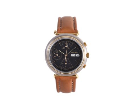 A MEN'S CHAUMET TITATNIUM AND GOLD PLATED AUTOMATIC WRISTWATCH Chronograph Day-DateBrand: Chaumet Case reference: EF 247 Year