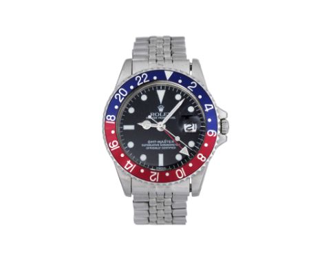 A MEN'S ROLEX STAINLESS STEEL AUTOMATIC GMT BRACELET WATCH GMT-Master.Brand: Rolex Model: GMT-Master Case reference: 1675 Yea