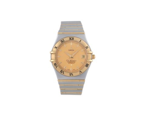 A MEN'S OMEGA STAINLESS STEEL AND 18K YELLOW GOLD AUTOMATIC BRACELET WATCH Constellation. Brand: Omega Model: Constellation C
