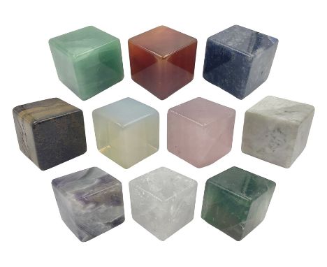 Ten cube mineral specimens, each cut and polished to highlight natural formations, including tiger eye, green aventurine, ros
