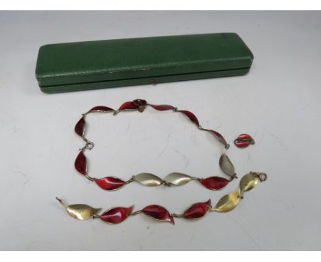 DAVID ANDERSON- A MODERNIST NORWEGIAN SILVER GILT AND ENAMEL JEWELLERY SUITE, comprising a necklace, bracelet and pair of ear
