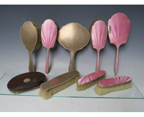 A COLLECTION OF HALLMARKED SILVER DRESSING TABLE ITEMS, comprising a five piece set with pink guilloche enamel embellishment,