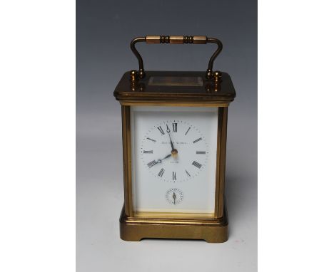 A MATTHEW NORMAN BRASS CARRIAGE CLOCK, the movement numbered '1750', H 14 cm