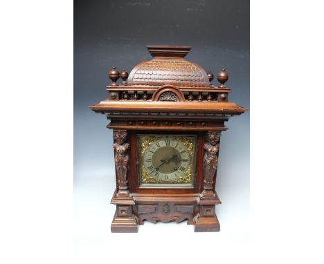 A LATE 19TH CENTURY MAHOGANY BRACKET CLOCK BY R M SCHNEKENBURGER, of architectural outline, the case with female figurative d