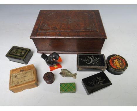 A VINTAGE OAK LIDDED BOX AND CONTENTS, containing a selection of collectable boxes etc., to include a Tunbridge ware counter 