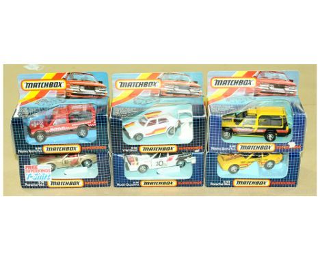 Matchbox Super Kings Group of Cars. (1) K86 VW Golf - white body with red/orange/yellow stripe tampo print, clear windows, re