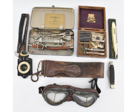 A collection of vintage 20th century items to include leather motorcycle / driving goggles, cased oak Wilkinson razor and acc