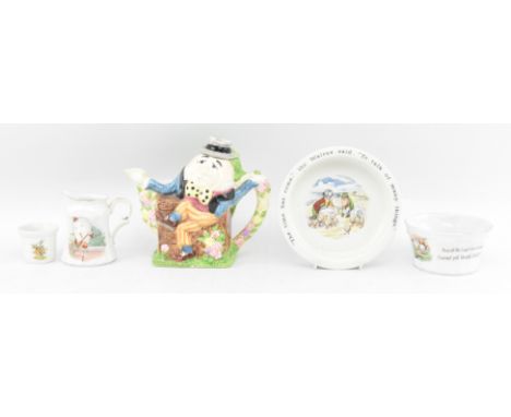 A collection of mid 20th century nursery rhyme ceramic items. The lot comprising a novelty Humpty Dumpty teapot in the manner