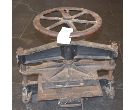 *Blocking Press.  A cast iron floor/bench standing blocking press,  platen approximately 31 x 25cm (12 x 10 inches), with cen