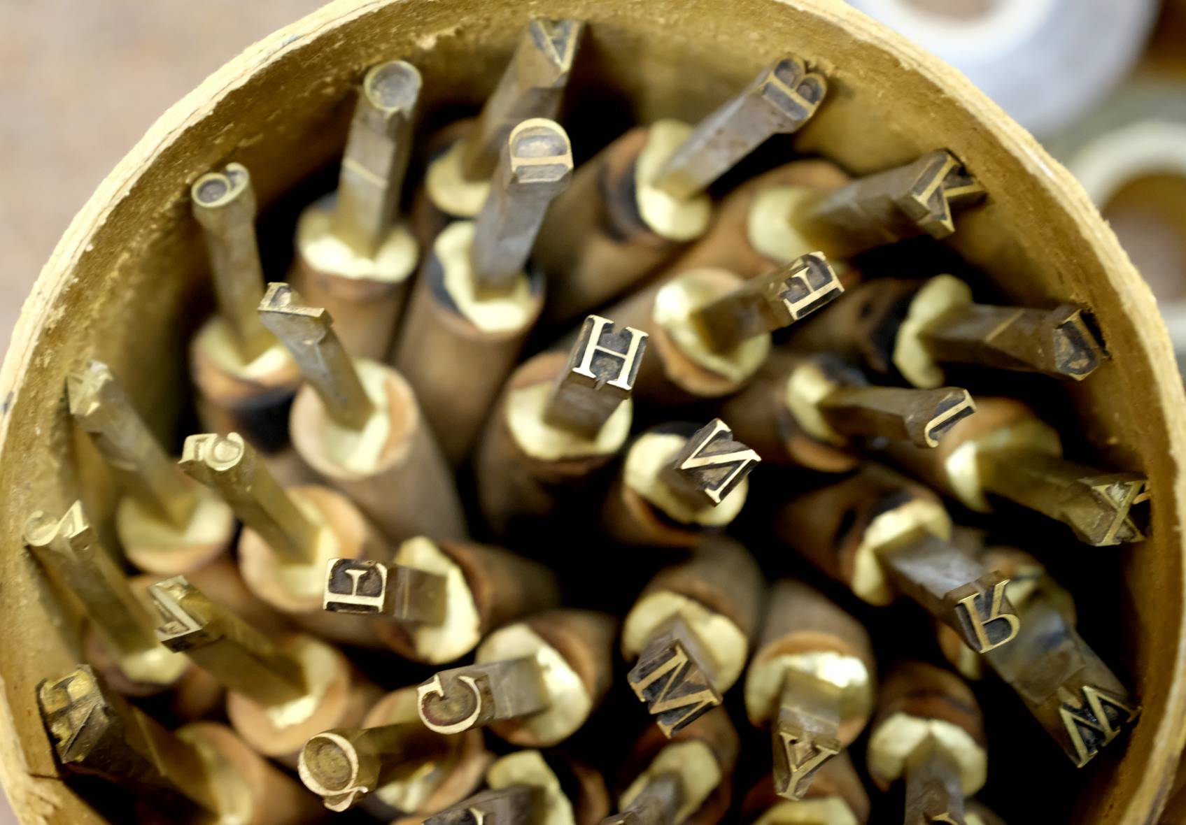 *Handle letters. Six sets of brass bookbinding handle letters, with