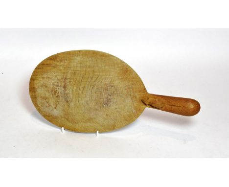 A Robert 'Mouseman' Thompson of Kilburn English oak cheese board, with carved mouse signature on the handle, 38.5cm (purchase