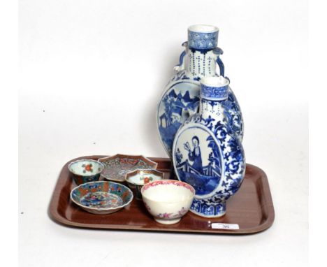 Two Chinese blue and white porcelain twin handled moon flasks, an 18th century tea bowl, two 19th century Oriental dishes and