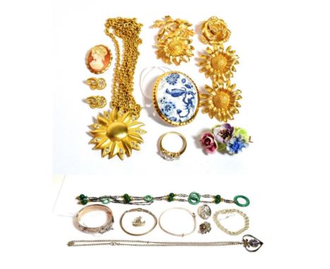 Assorted costume jewellery including three silver bangles; three silver brooches; a Christian Dior earring etc 