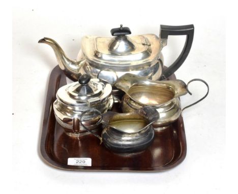 A three-piece Edward VIII silver tea-service, each piece bombe, the teapot with composition handle and finial, together with: