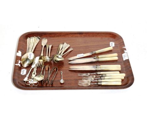 A mixed lot of silver flatware, including: a set of six Old English pattern dessert-spoons, Sheffield, 1932; a Fiddle pattern