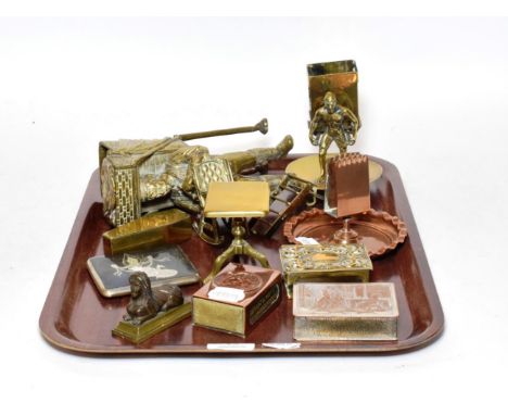 A Siam cigarette case stamped 'Sterling' , two novelty figural brass match holders/strikers, a brass coffin form snuff, three