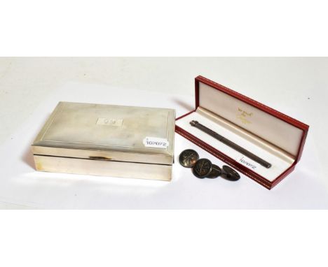 A silver cigarette-box, Birmingham, 1975, oblong and with engine-turned decoration; a French Silver-plate mounted pencil, by 