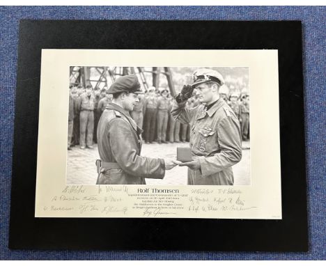 WW2 Kapitanleutnant Rolf Thomsen and 16 of his Crew Signed Black and White Print Showing Thomsen Receiving a Medal on 30th Ap