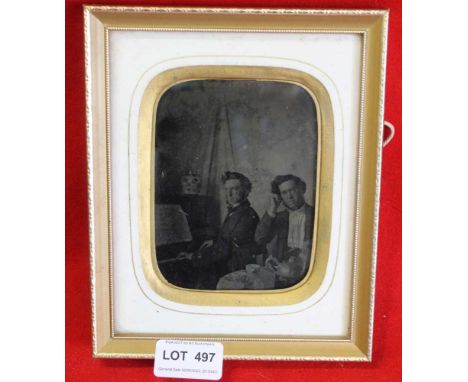 A mid to late 19th century photograph of two gentlemen, one playing the piano, framed &amp; glazed, 17cm x 13cm